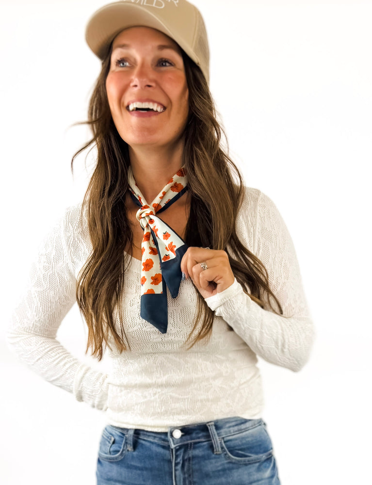 
                  
                    Rust Floral & Navy Twilly Scarf
                  
                