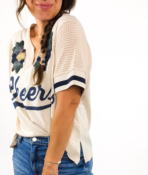 
                  
                    Cheers Tee (Beige)
                  
                