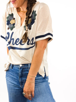 
                  
                    Cheers Tee (Beige)
                  
                