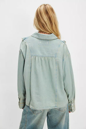 
                  
                    Ruffled Chambray Blouse
                  
                
