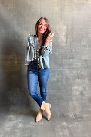 
                  
                    Ruffled Chambray Blouse
                  
                