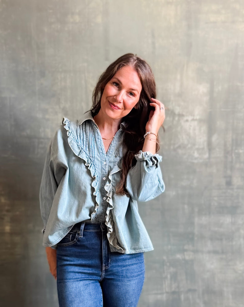 
                  
                    Ruffled Chambray Blouse
                  
                