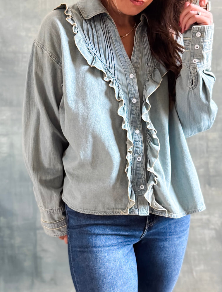 
                  
                    Ruffled Chambray Blouse
                  
                