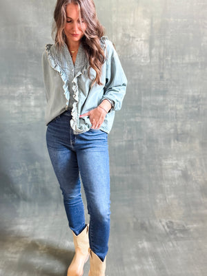 
                  
                    Ruffled Chambray Blouse
                  
                