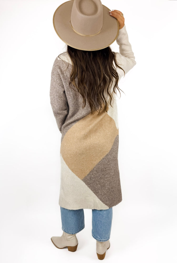 
                  
                    Casper Cardigan
                  
                
