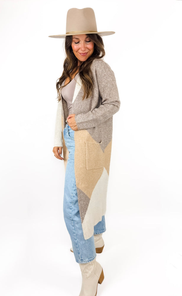 
                  
                    Casper Cardigan
                  
                