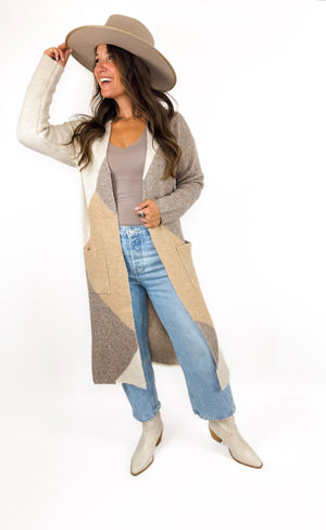 
                  
                    Casper Cardigan
                  
                