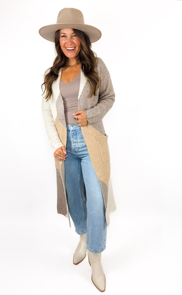
                  
                    Casper Cardigan
                  
                