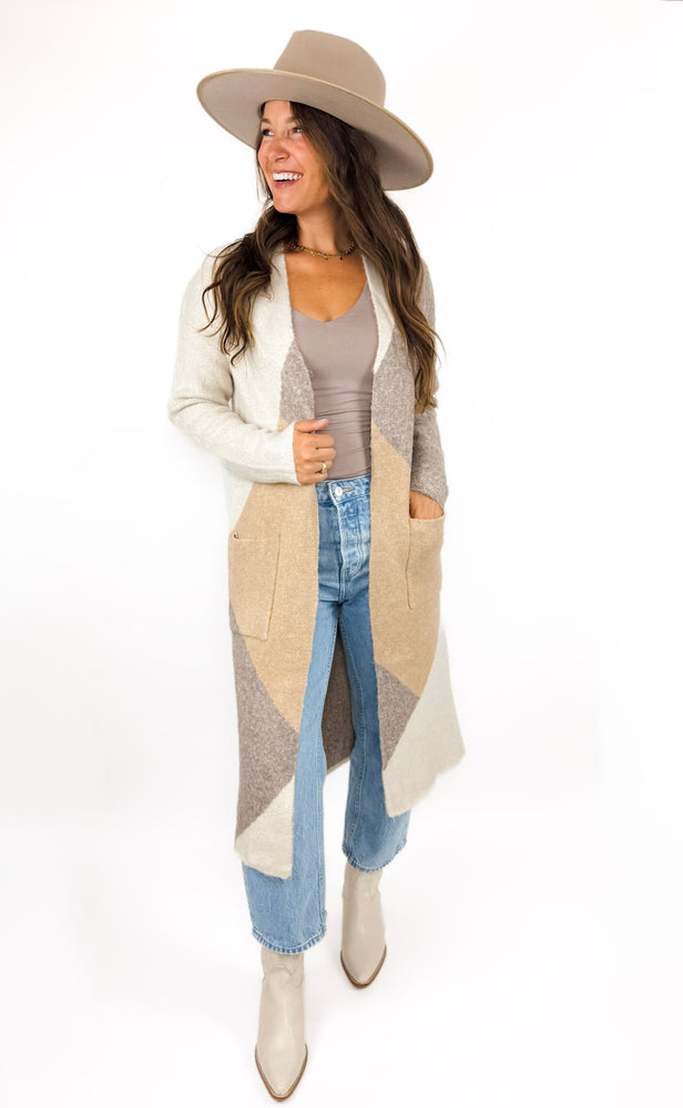 
                  
                    Casper Cardigan
                  
                