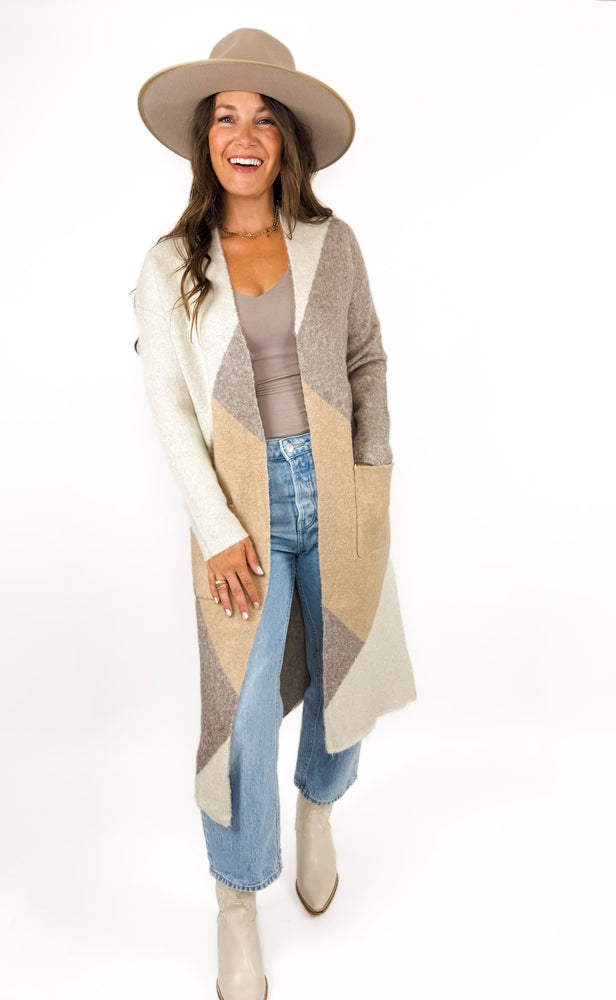 
                  
                    Casper Cardigan
                  
                
