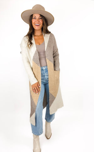 
                  
                    Casper Cardigan
                  
                