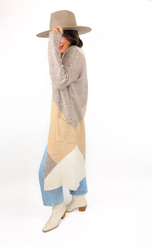 
                  
                    Casper Cardigan
                  
                