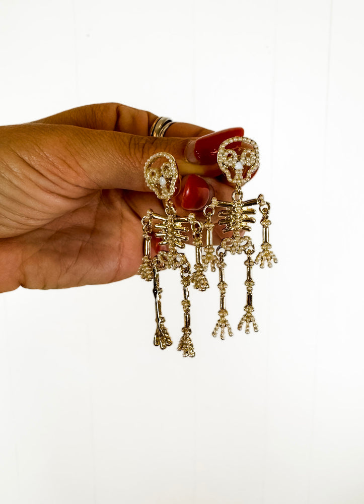 
                  
                    Skelly Earrings
                  
                