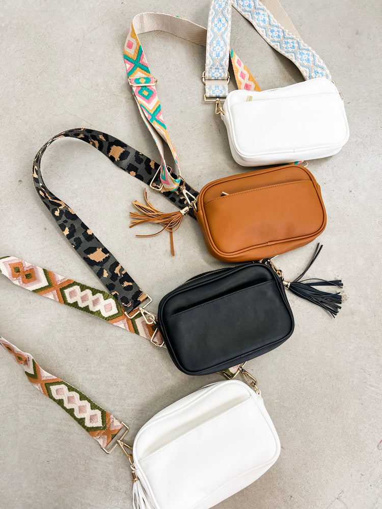 
                  
                    Courtney Crossbody ((white + sky blue pattern strap))
                  
                