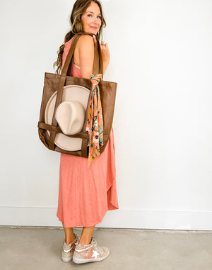 
                  
                    The Hat Tote ((brown vegan leather))
                  
                
