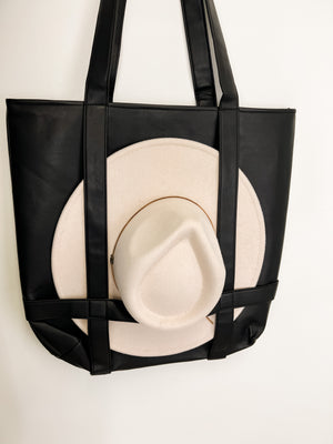 
                  
                    The Hat Tote ((black vegan leather))
                  
                