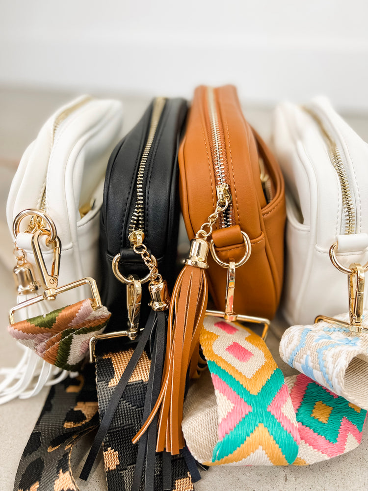 
                  
                    Courtney Crossbody ((white + sky blue pattern strap))
                  
                
