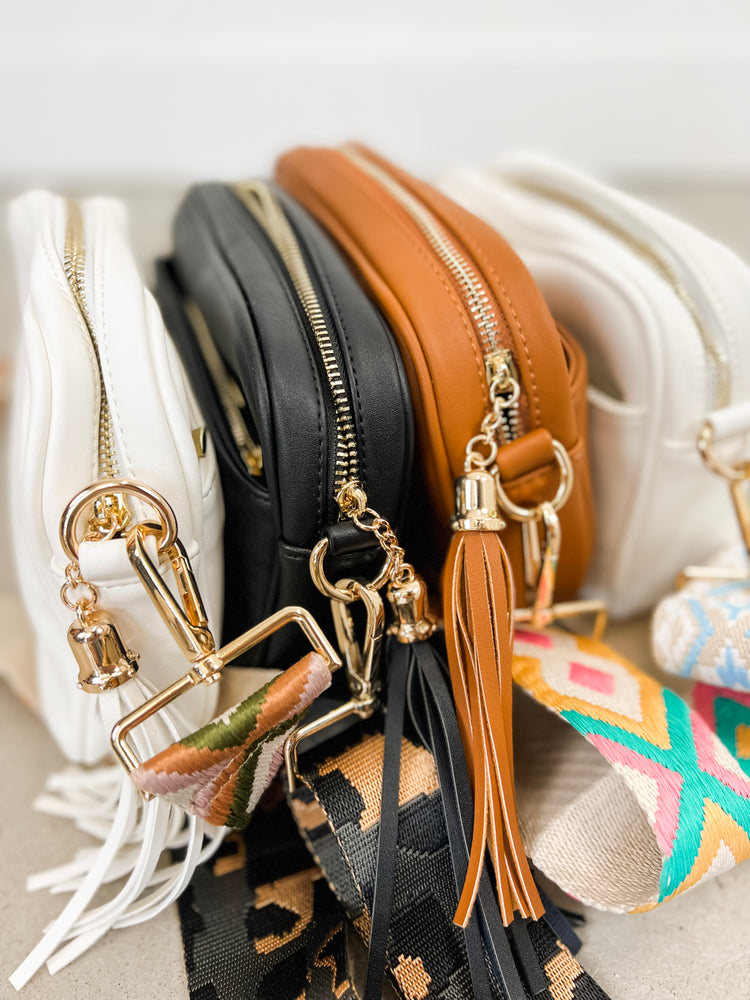 
                  
                    Courtney Crossbody ((white + sky blue pattern strap))
                  
                