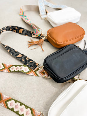 
                  
                    Courtney Crossbody ((white + sky blue pattern strap))
                  
                